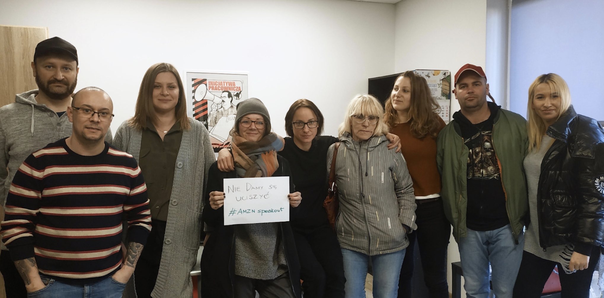 Magda and Inicjatywa Pracownicza union members standing along with fellow Amazon workers throughout Europe against the company’s 2020 retaliation of corporate office workers organizing with Amazon Employees for Climate Justice.